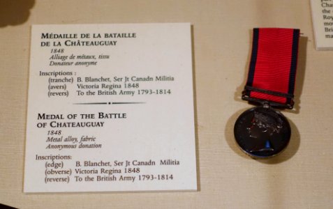Medal of the Battle of Chateauguay, 1848, metal alloy, fabric - Château Ramezay - Montreal, Canada - DSC07493