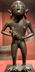 Maternity figure, Borneo, c. 200 BCE, bronze, Honolulu Museum of Art