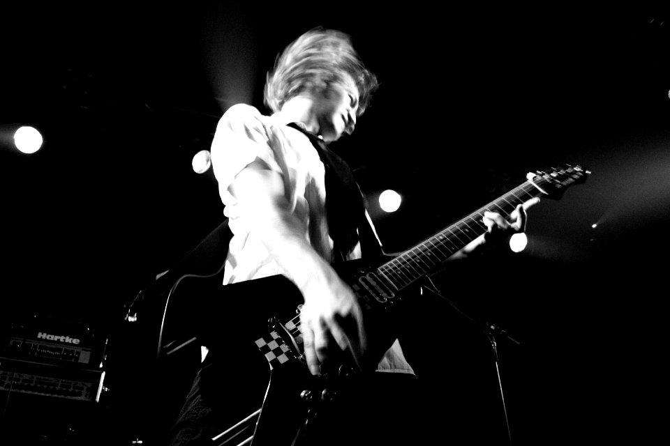 Moms Day lead guitarist live in concert