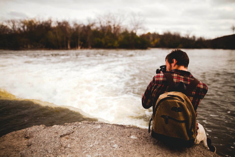 Photographer river taking photo