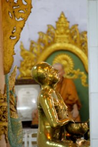 Monk in Chaukhtatgyi Buddha temple Yangon Myanmar (3) photo