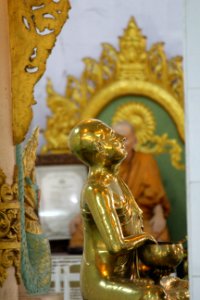 Monk in Chaukhtatgyi Buddha temple Yangon Myanmar (4) photo