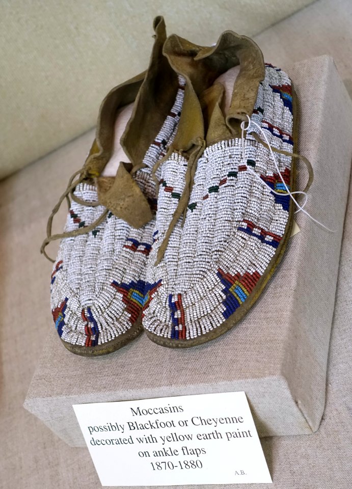 Moccasins, possibly Blackfoot or Cheyenne, 1870-1880, decorated with yellow earth paint on ankle flaps - Robbins Museum - Middleborough, Massachusetts - DSC03899