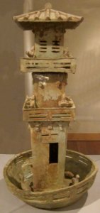 Model of a watch tower with archers, Han dynasty, earthenware with glaze, Honolulu Museum of Art