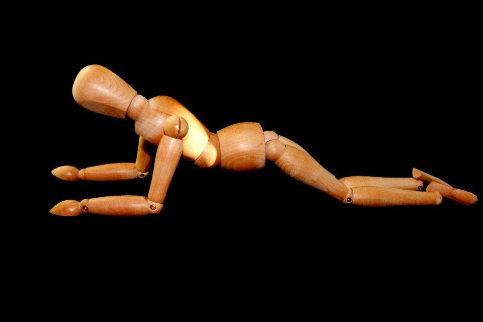 Propped up doll holzfigur