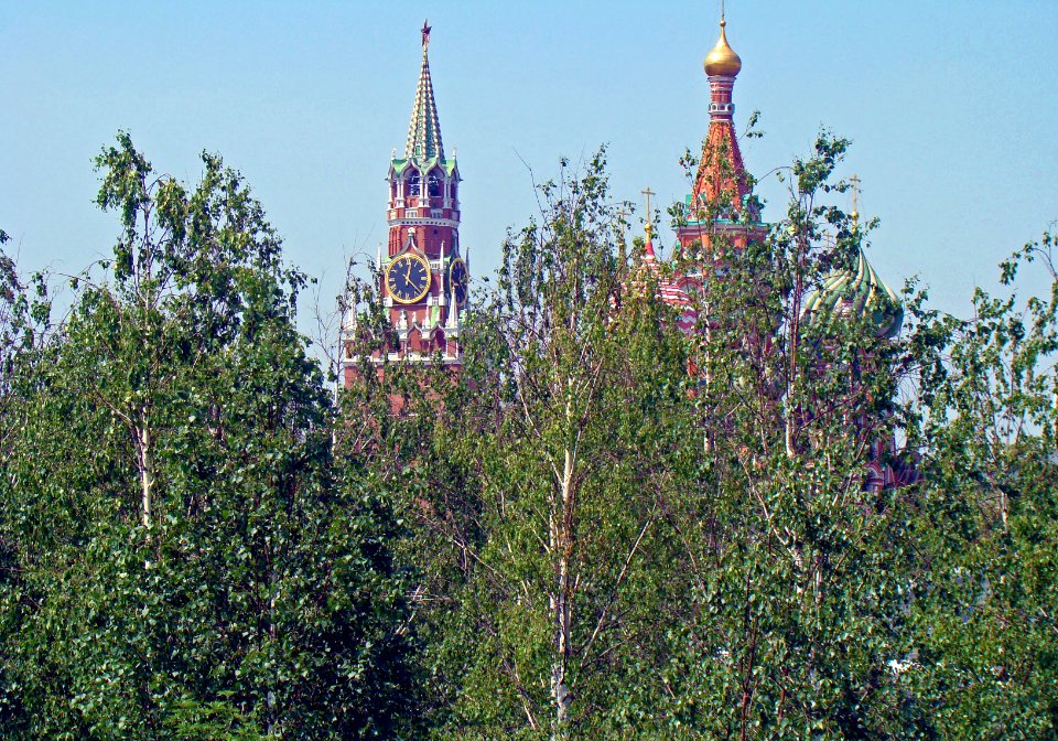 Moscow, Zaryadye Park. View to the Kremlin and Saint Basil's Cathedral through the trees