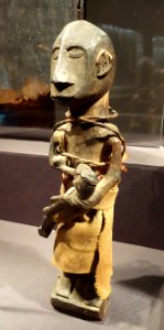 Mother and child, Atauro Island, 19th-20th century, wood, fabric - De Young Museum