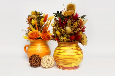Dried decorative flowers ceramics photo