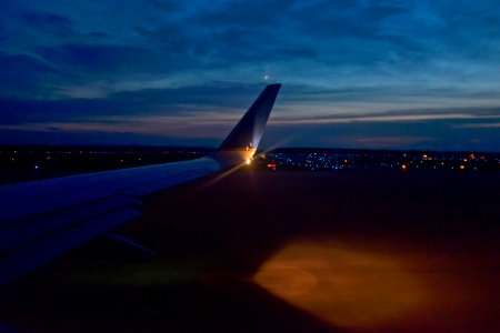 Moon over United Airlines Airplane Wing