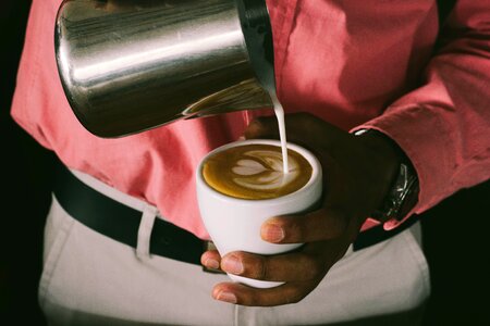 Cafe latte art making coffee photo