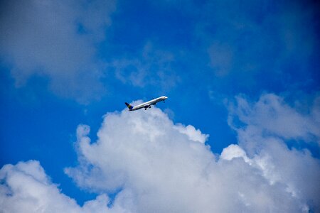 Blue sky clouds plane