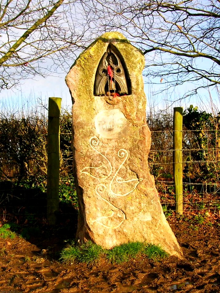 Milestone at foot of Tor