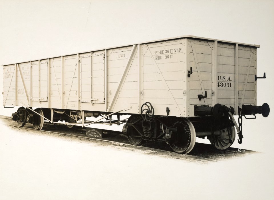Military Administration - Transportation - Rail - Construction - CARS MANUFACTURED FOR GOVERNMENT BY HASKELL & BAKER CO. MICHIGAN CITY, INDIANA. Side view of high side business gondola - NARA - 45502171 (cropped)