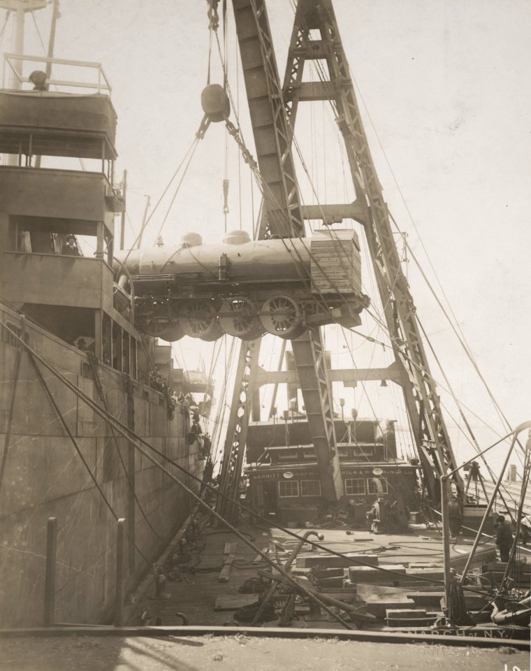 Military Administration - Transportation - Rail - LOADING LOCOMOTIVES AND TENDERS ON VESSEL FOR SHIPMENT OVERSEAS - NARA - 45501832 (cropped)