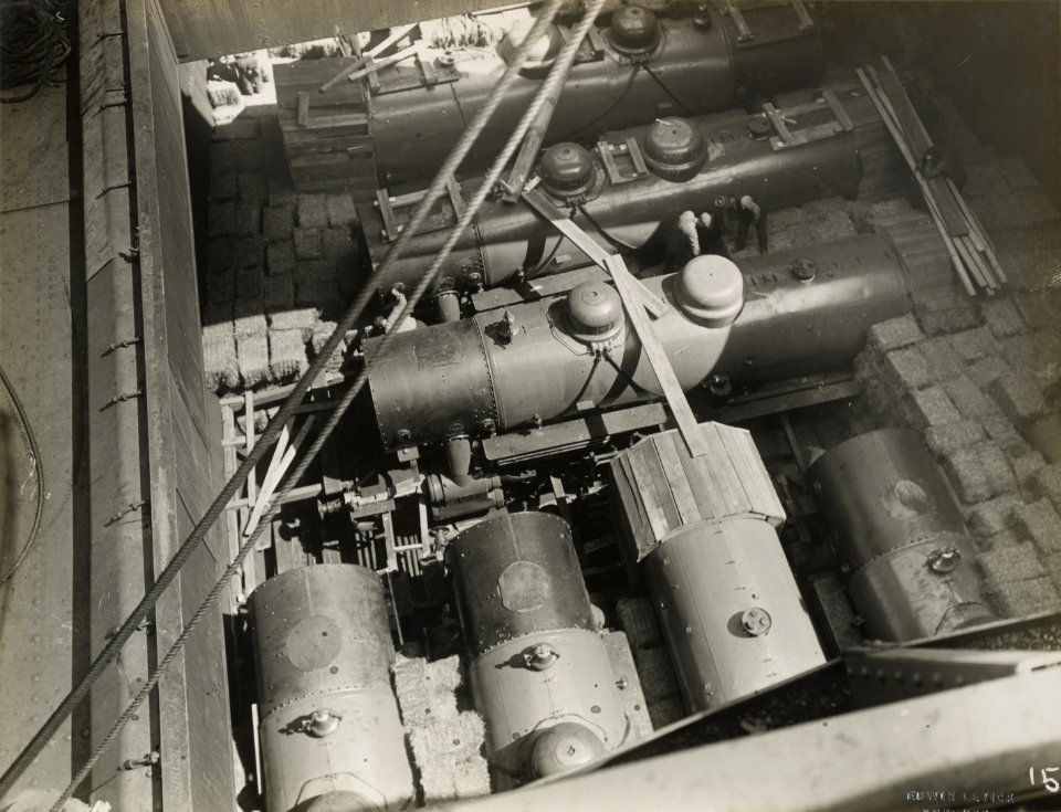 Military Administration - Transportation - Water - Docks and Piers - LOADING LOCOMOTIVES ABOARD S.S. FELTORE, N.Y. Shows method of packing baled hay between locomotives to prevent jarring - NARA - 45502315 (cropped)