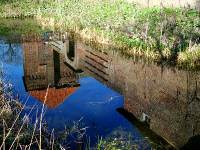 Mill Rijksmonument 8859 Kasteel Tongelaar gereflecteerd in slotgracht