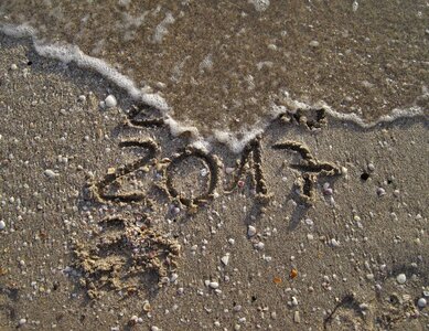 Beach sand new year's greetings