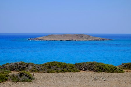 Mikronisi as seen from Chrysi photo