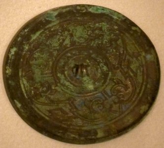 Mirror with cloud and lightning design, Western Han dynasty, bronze, Honolulu Museum of Art