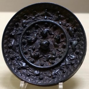 Mirror with sea beast and grape design, excavated at Manako, Hoshino-mura, Yame-shi, Fukuoka, Japan, Nara period, 700s AD, bronze - Tokyo National Museum - Tokyo, Japan - DSC09317