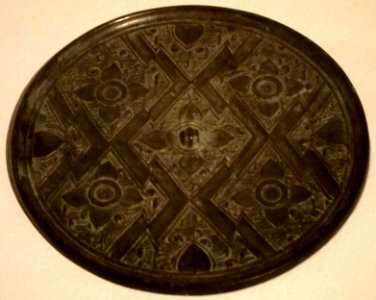 Mirror with flower design, Warring States period, bronze, Honolulu Museum of Art