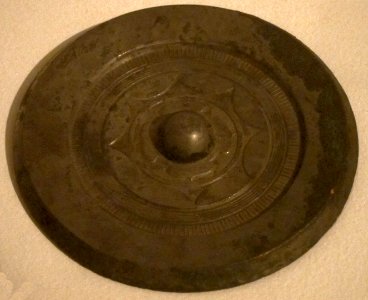 Mirror with continuous arc design, Eastern Han dynasty, bronze, Honolulu Museum of Art