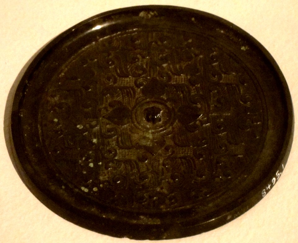 Mirror with flower and feather design, Warring States period, bronze, Honolulu Museum of Art