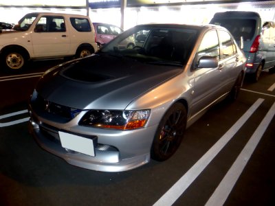 Mitsubishi LANCER GSR Evolution IX MR at night front