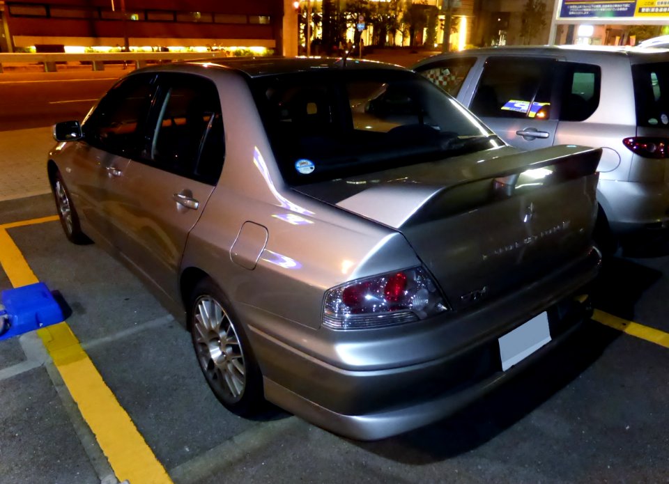 Mitsubishi LANCER EVOLUTION VII GT-A at night rear