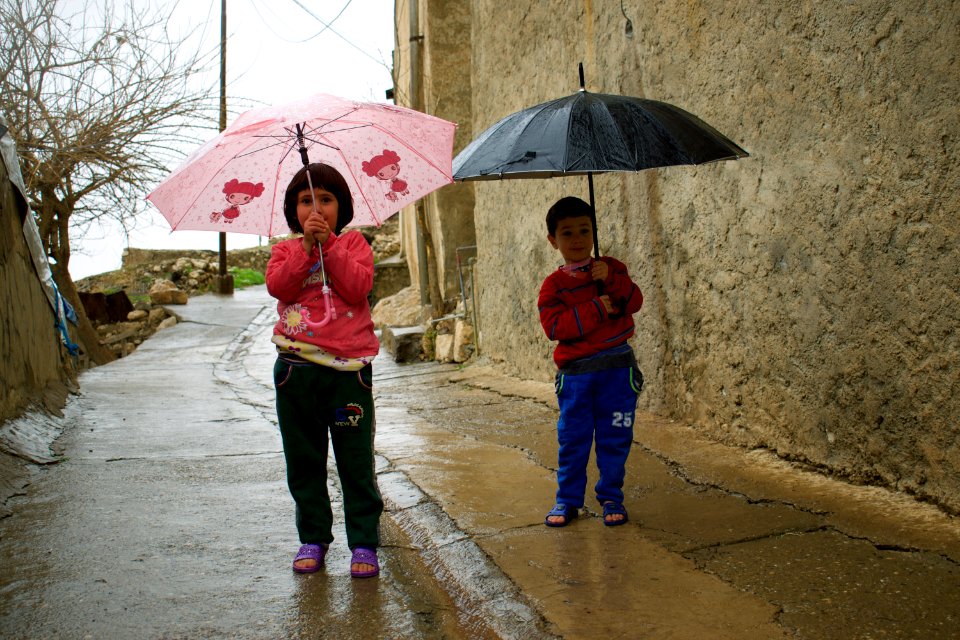 Nasir, the gatekeeper of the Shrine of Nahum in alQosh, with his kids 02