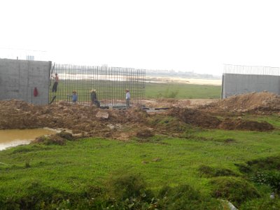 Nandu River floodwall construction at Ding an - 03