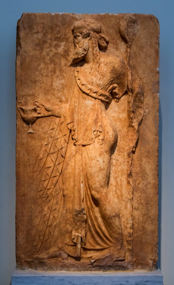 NAMA 3727 Dionysos holding a kantaros and a thyrsos votive relief