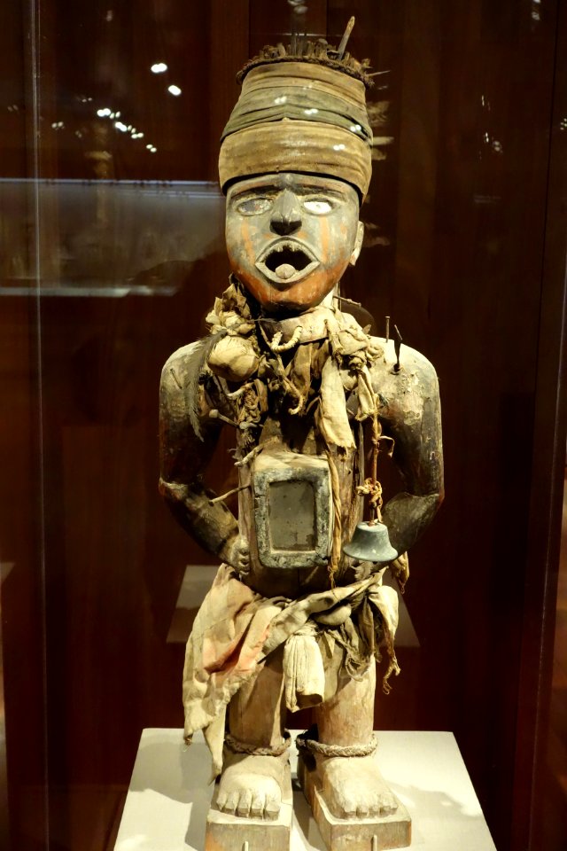 Nail and blade oath-taking figure, Democratic Republic of Congo, Kongo people, 19th century, wood, metal, nail, horn, branches, glass - De Young Museum - DSC01089