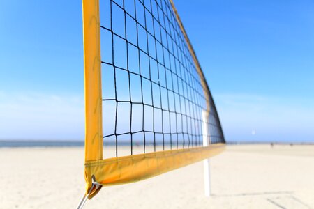 Beach volleyball volleyball net playing field photo