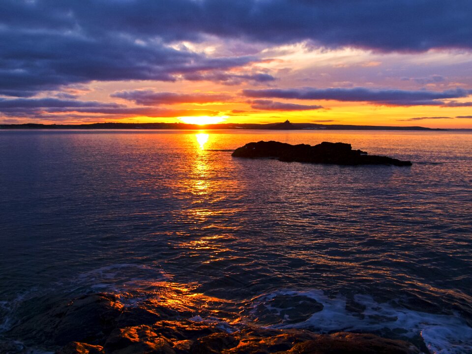 Coast sunrise rock