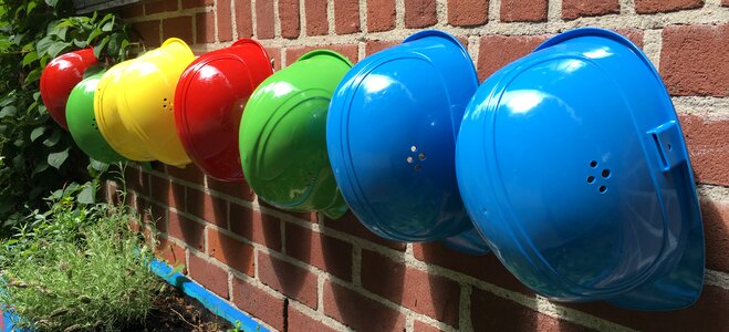 Green construction helmets art