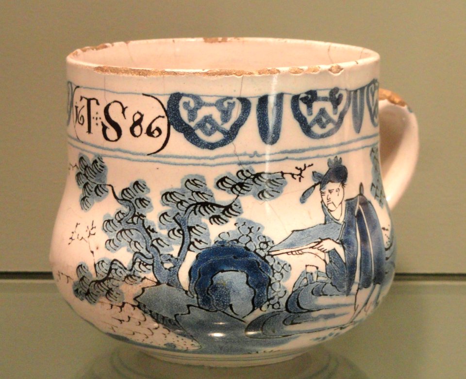 Mug with a Chinese figure in a garden, dated 1686, London or Bristol, tin-glazed earthenware - Gardiner Museum, Toronto - DSC01230
