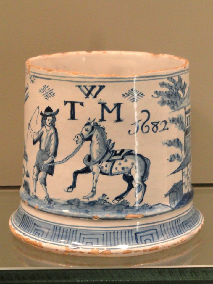 Mug with a wagon, man, and horse, dated 1682, London or Bristol, tin-glazed earthenware - Gardiner Museum, Toronto - DSC01229