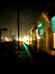 Moving train at Jersey Avenue NJT photo