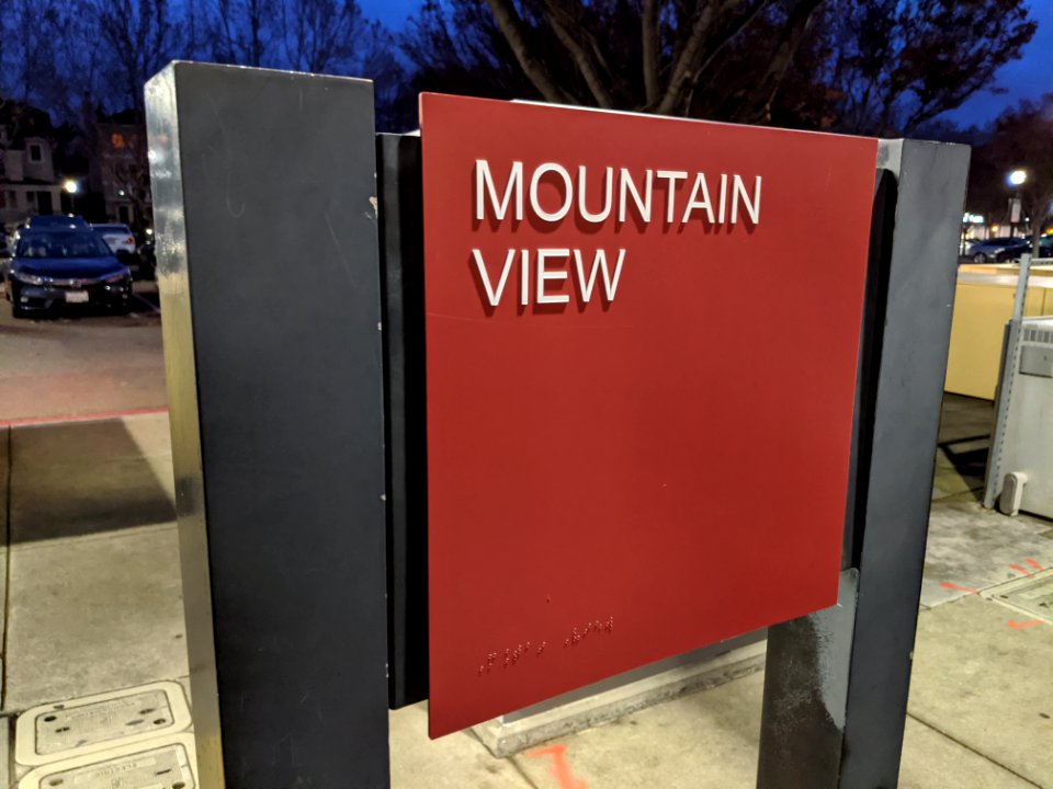 Mountain view Caltrain station sign at night
