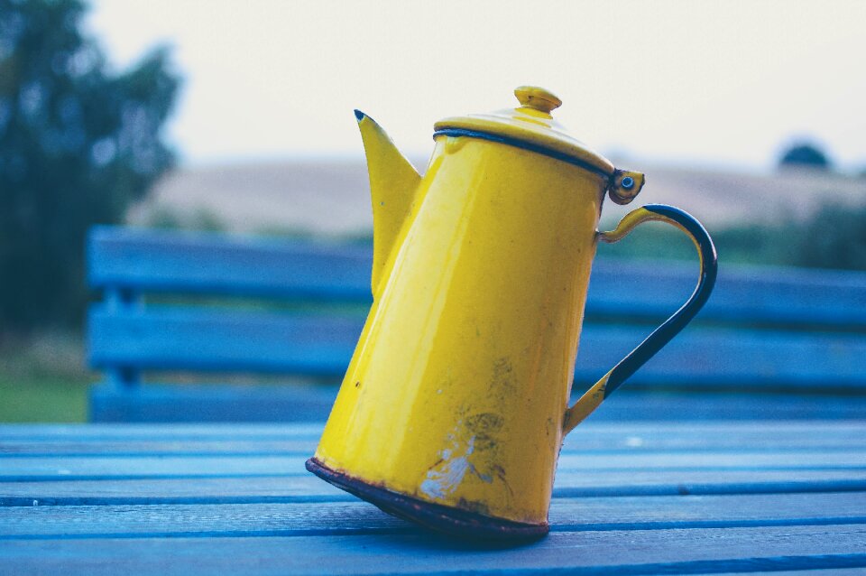 Teapot wooden blue table