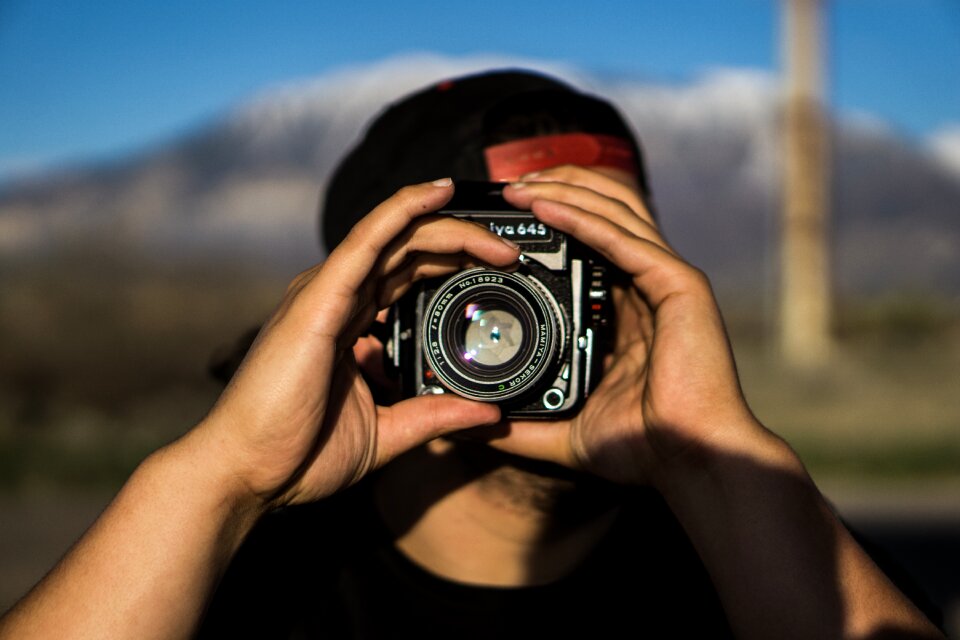 Man photographer taking photo