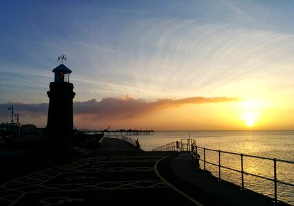 Lighthouse sunrise seaside