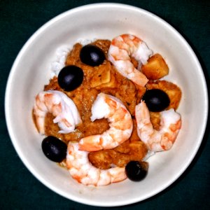 Mushroom masala on white rice, with shrimp and black olives - Massachusetts