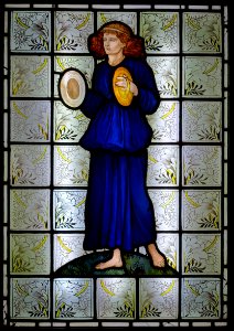 Musician with cymbals, by William Morris, designed c. 1868, glass, view 1 - Hessisches Landesmuseum Darmstadt - Darmstadt, Germany - - Hessisches Landesmuseum Darmstadt - Darmstadt, Germany - DSC01053