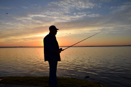 Fishing sunrise lake toho photo