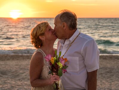 Beach wedding sunset photo