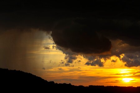 Rain sunset storm photo