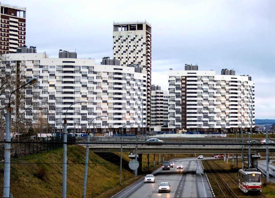 Nizhny Novgorod. Tram on the Okskiy descent and new apartment buildings of the 'Marshal Grad' residential complex
