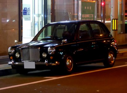 Nissan MARCH mooku Princess (K11) at night front